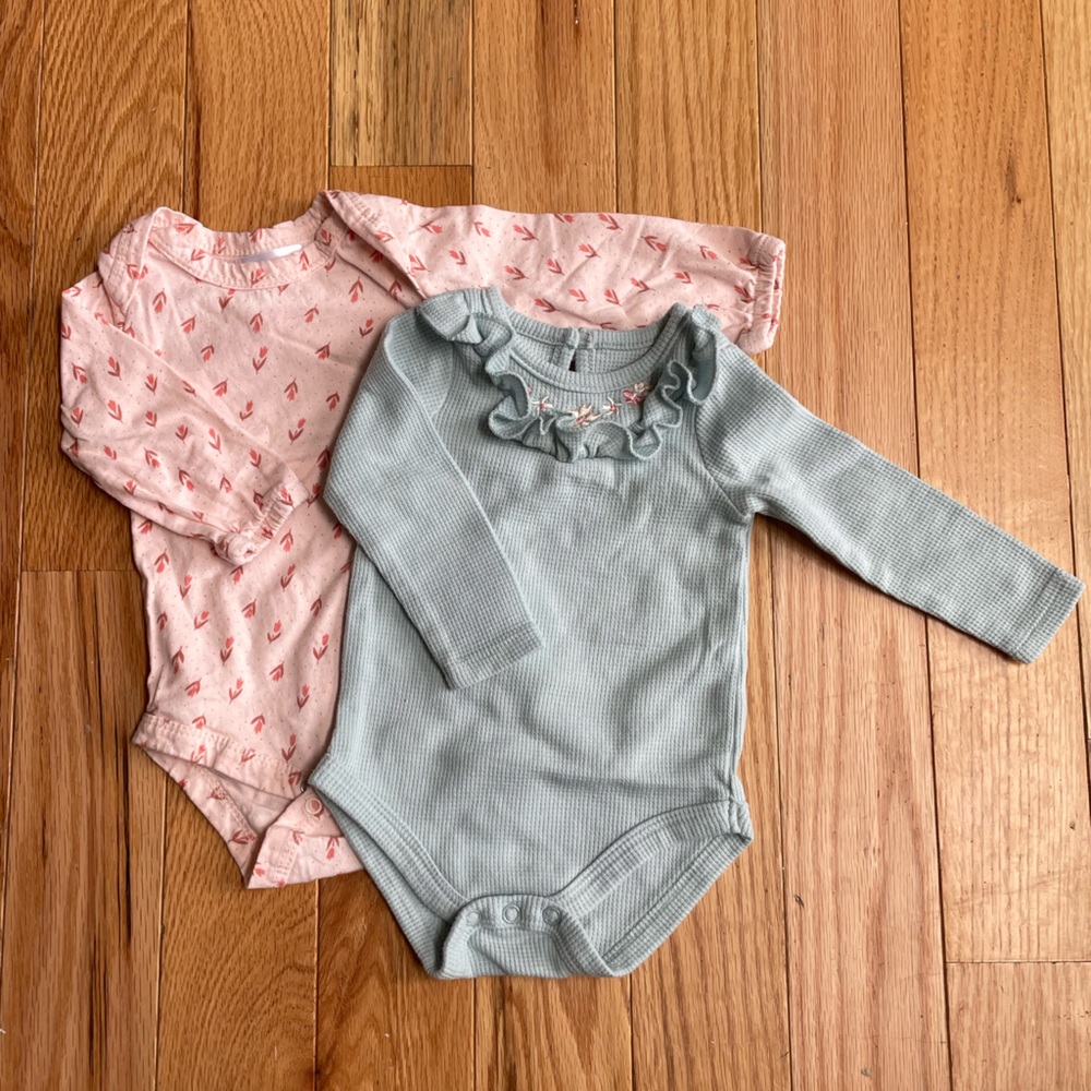 Two 6-9 month pink and green long-sleeved onesies